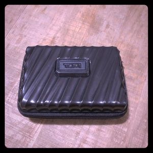TUMI hard shell travel case